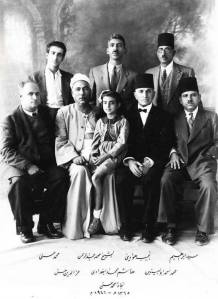 Famous Iraqi Calligrapher Hashem Mohammad Al-Baghdadi is standing in middle (beside Najat’s brother Ezzidin). He came to Cairo to see Najat’s father (sitting on the left). Najat (sitting at front) 
